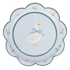 Decorative plate with a goose design on a light blue background