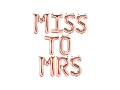 Rose gold balloon letters spelling 'MISS TO MRS' on a white background