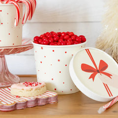 Decorative bowl with red candies and a matching lid